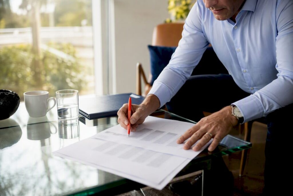 CEO hands adjusting leadership scorecard